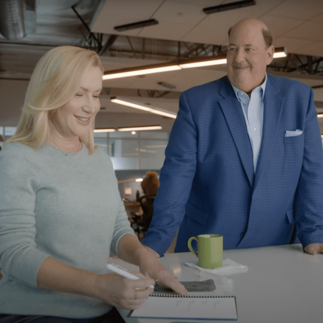 Still of Angela Kinsey and Brian Baumgartner's commercial for Rocketbook